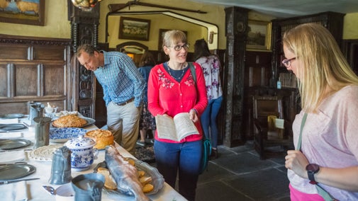 Visitors exploring the collection at Townend, Cumbria